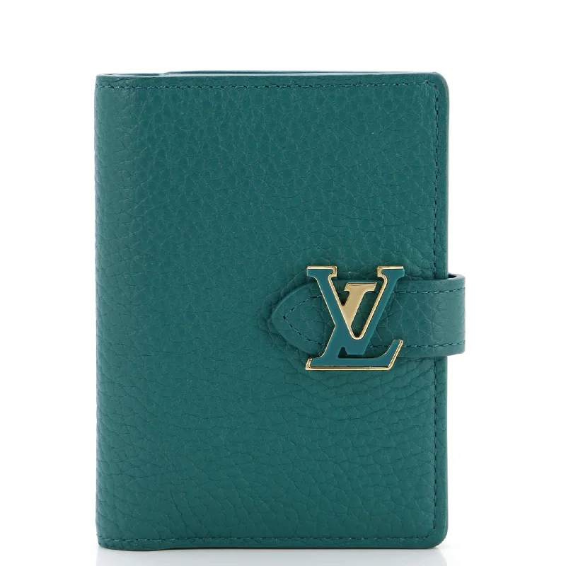 LV Vertical Wallet Taurillion Leather Compact